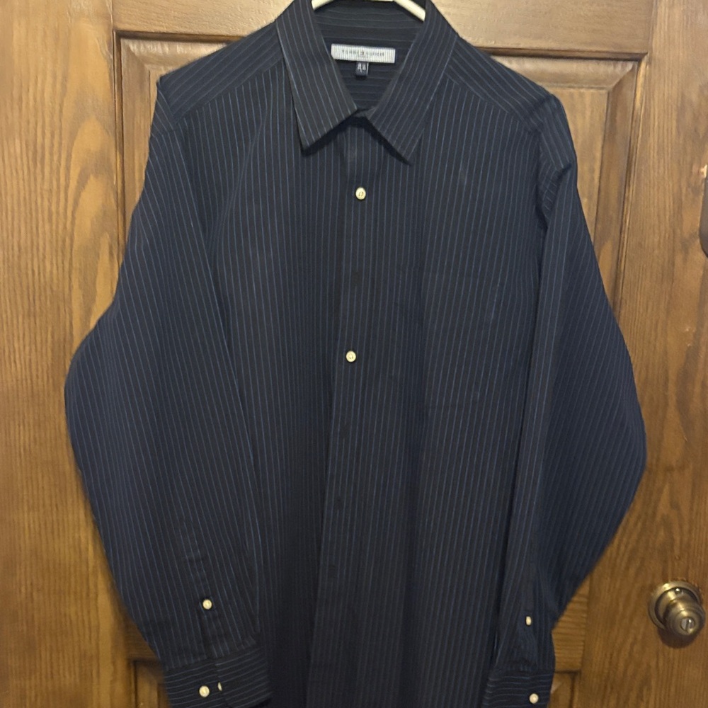 This Tommy Hilfiger dress shirt looks great on.